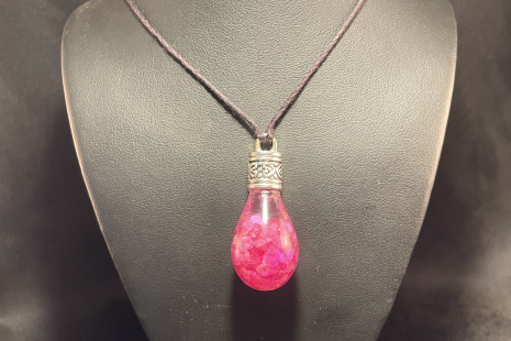 Ruby UV reactive Globe Amulet